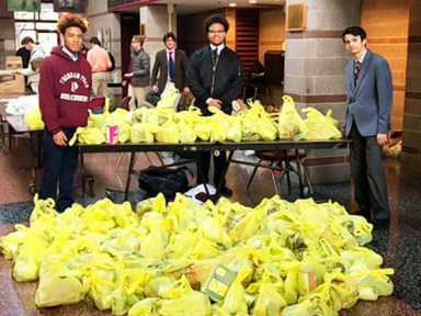 Fordham Prep distributes food to Bronx charities|Fordham Prep distributes food to Bronx charities