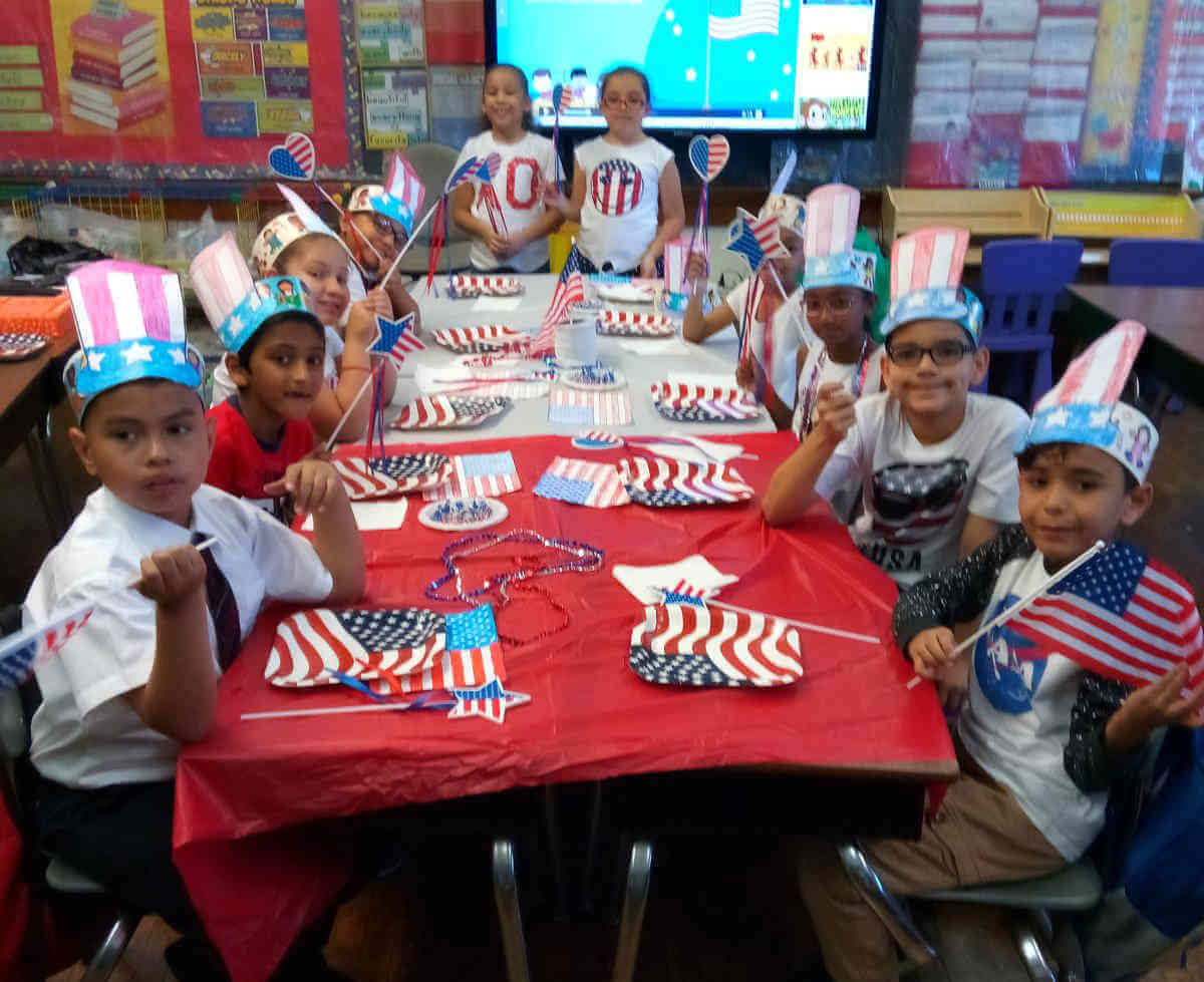 Holy Family Students Salute Flag Day