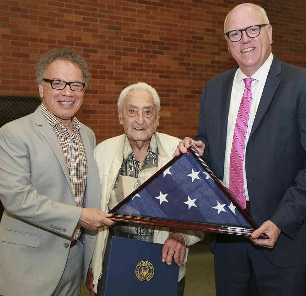 Crowley Presents Flag To 100-Year-Old WWII Vet