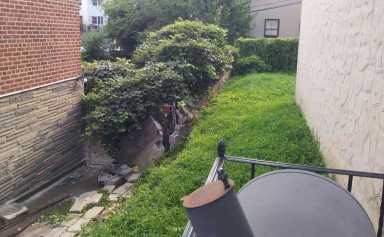 Damaged wall causes Throggs Neck neighbors to clash