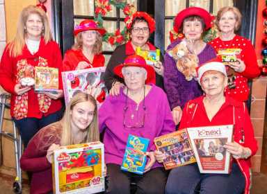 Red Hat Roses Donate Toys To Engine 89/Ladder 50