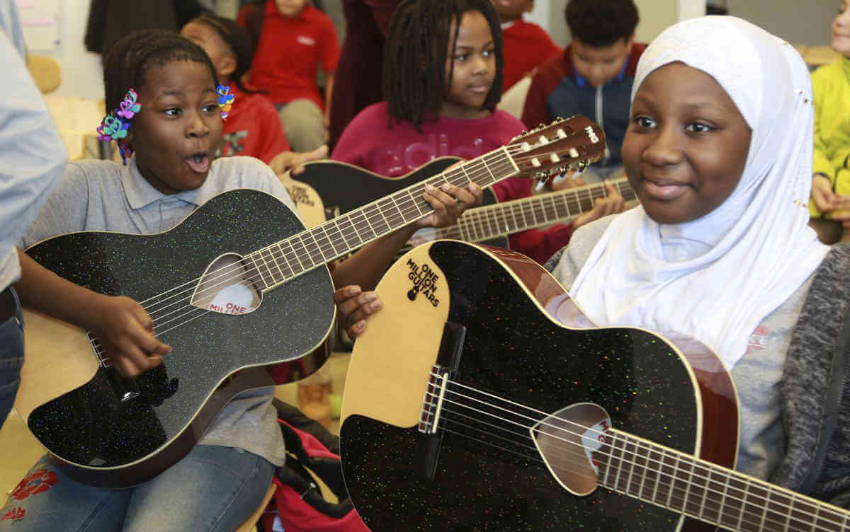 Heketi Students Receive Donated Guitars|Heketi Students Receive Donated Guitars
