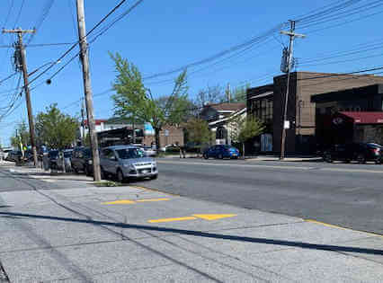 Mall owner summonsed for expanding driveway curb cut