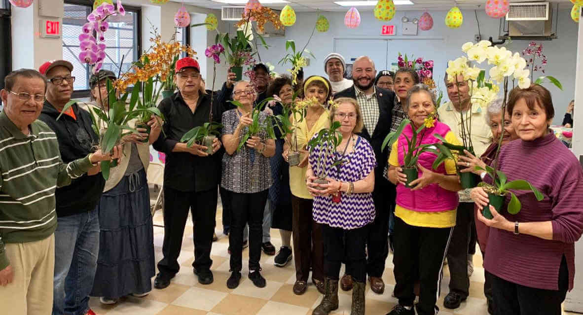 Salamanca Gives NYBG Orchids to Erma Cava Elders