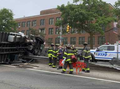 2 Injured In Truck Overturn On Bruckner