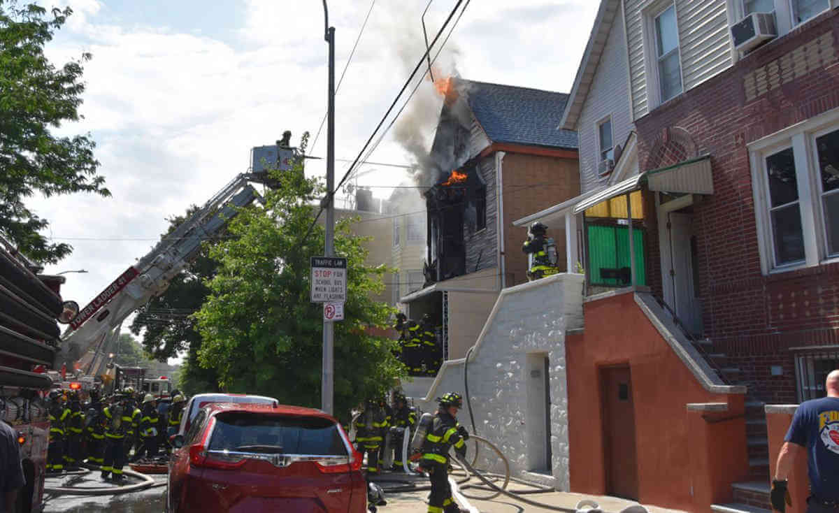 Firefighters Combat VN House Fire