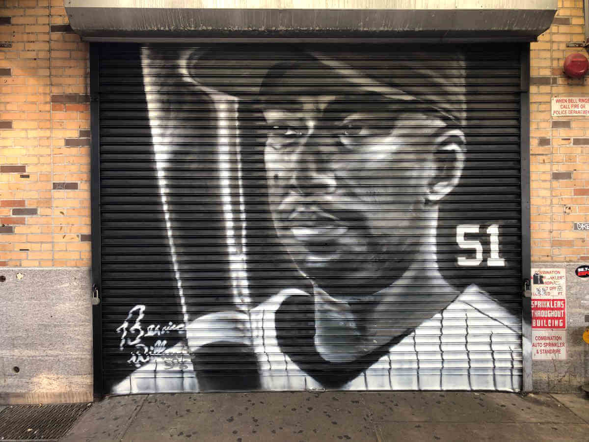 Trenier sprays Bernie Williams mural Billy’s gate|Trenier sprays Bernie Williams mural Billy’s gate