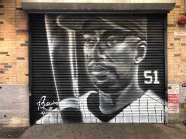 Trenier sprays Bernie Williams mural Billy’s gate|Trenier sprays Bernie Williams mural Billy’s gate
