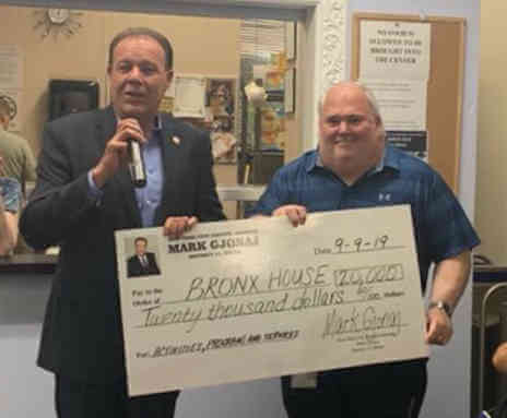 Councilman Gjonaj donates two checks at Bronx House