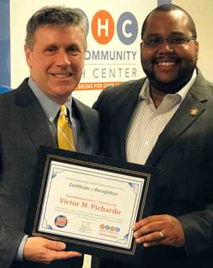Union Community Health Center presents award to Pichardo