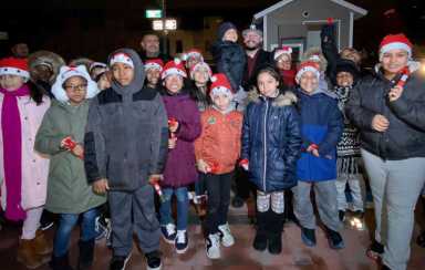 Tree lighting held by Salamanca, CB2, 41st Precinct