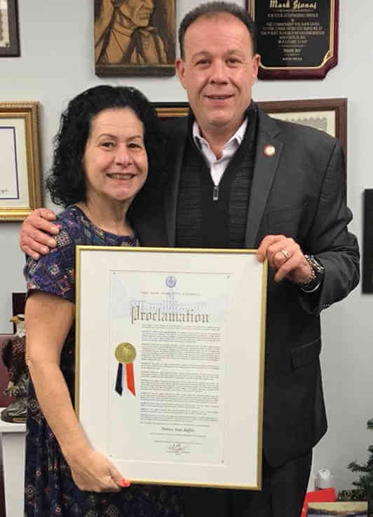 St. Clare Senior Center’s director receives proclamation as she retires
