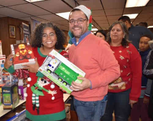 St. Helena’s Church holiday party also honored Father David