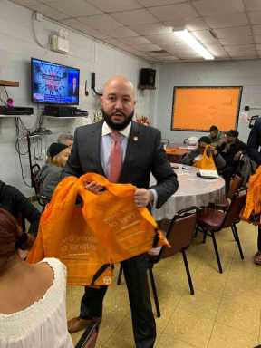 Giveaway held in preparation for an upcoming plastic, paper bag laws