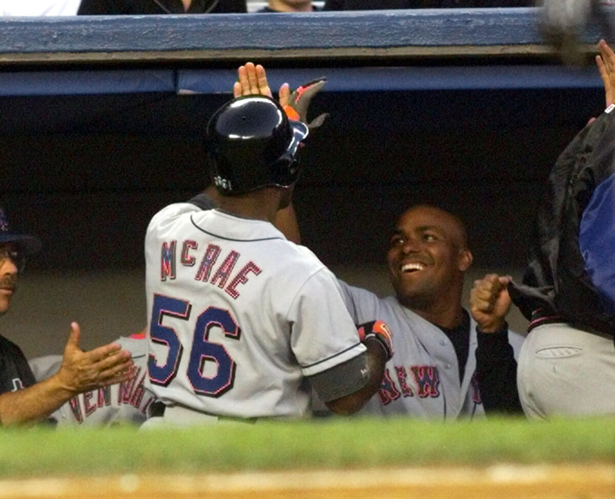METS MCRAE WELCOMED BY BONILLA AFTER HOME RUN AGAINST YANKEES.