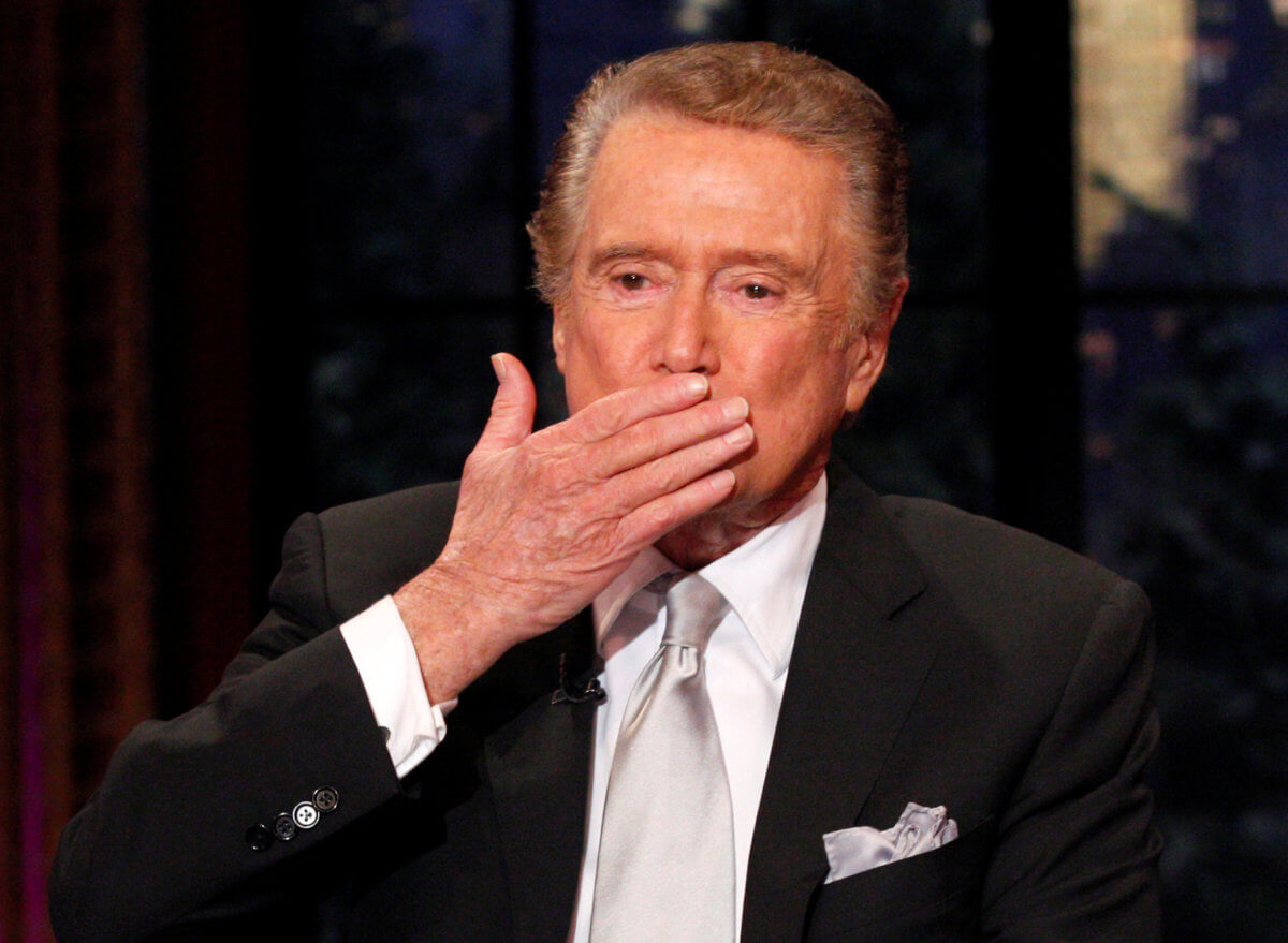 FILE PHOTO: Television host Regis Philbin blows a kiss goodbye during his final show of “Live With Regis and Kelly” in New York