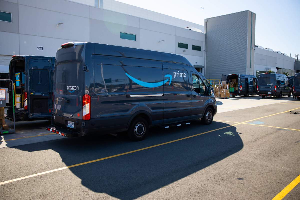 Delivery vans in loading lot area