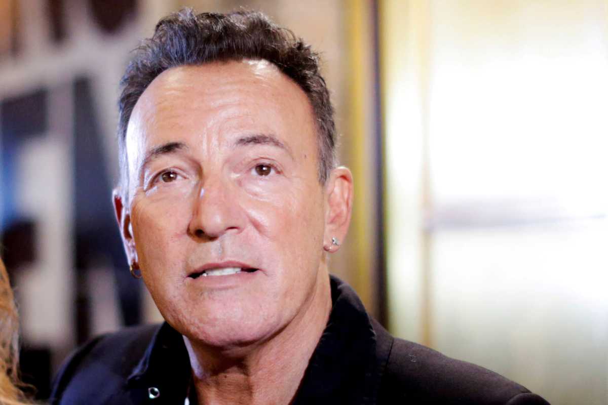 FILE PHOTO: Singer Bruce Springsteen exits the theatre after attending the Broadway debut of “Springsteen on Broadway” at the Walter Kerr Theatre in New York