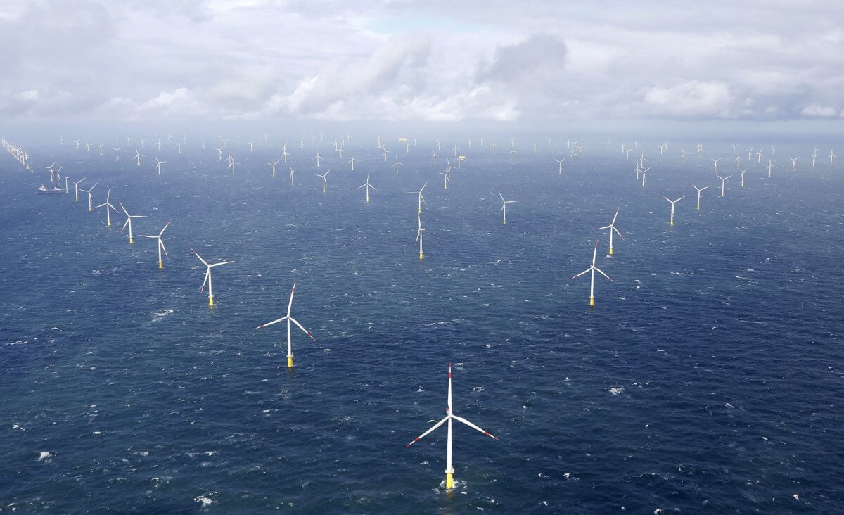 FILE PHOTO: Power-generating windmill turbines are pictured at the ‘Amrumbank West’ offshore windpark in the northern sea near the island of Amrum