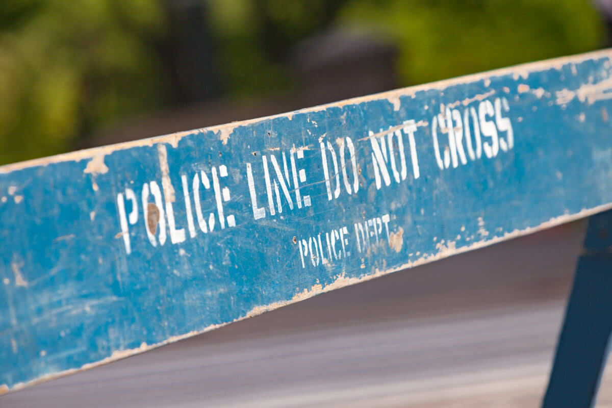Police line, do not cross sign