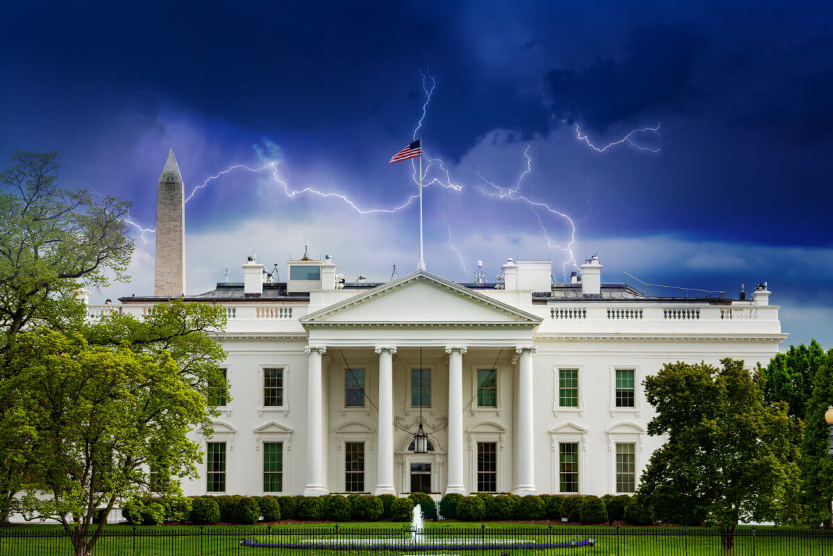 White house over stormy sky with lightings