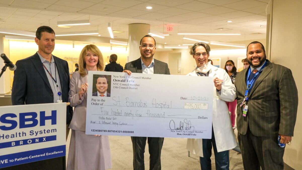 Feliz presents St. Barnabas Hospital with check for 495K Bronx Times