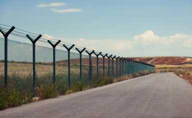 Road next to a fence