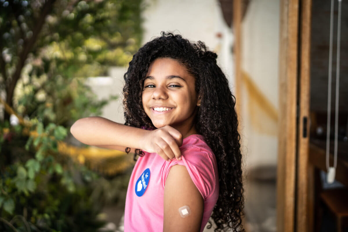 Portrait of girl showing ar after vaccination