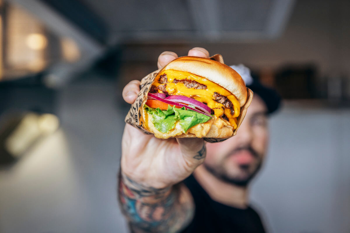 222Double New York Burger held by Anthony M DiCicco – Photo by Charlie Bennet