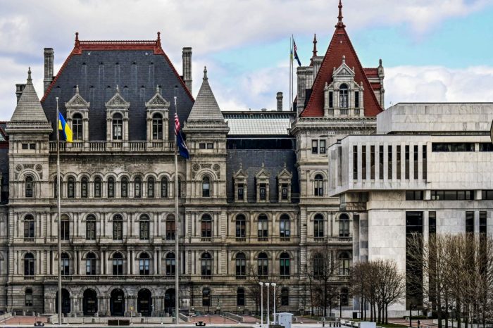 FILE - A partial views of the New York state Capitol building, left, is shown next to the state Appellate court building in foreground, right, Monday, April 4, 2022, in Albany, N.Y. A panel of five mid-level New York appellate judges have ruled on Thursday, April 21, 2022 that state Democrats engaged in gerrymandering when drawing new congressional district boundaries for the next decade.