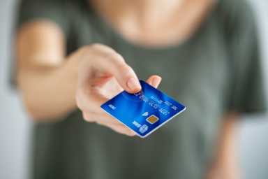 Woman hand showing credit card