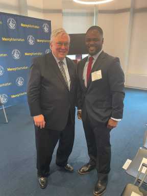 Mercy College President Tim Hall and Karim Marshall