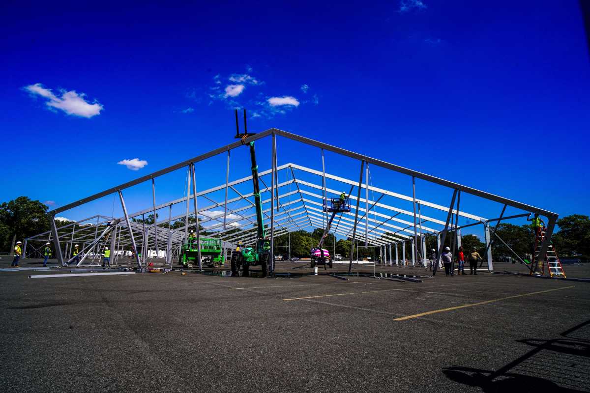 Construction on a humanitarian relief center for asylum seekers begins on Tuesday, Sept. 27 in Orchard Beach, Bronx.