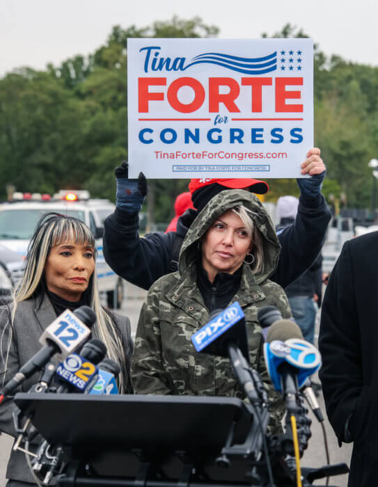 Congressional candidate Tina Forte speaks in opposition to the Orchard Beach migrant shelter during a demonstration at the construction site on Saturday, Oct. 1, 2022.