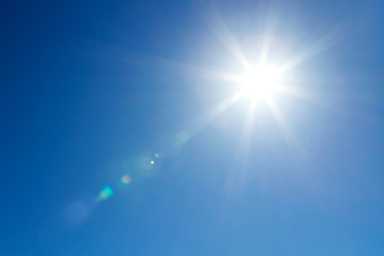 Sun at the sky with copy space