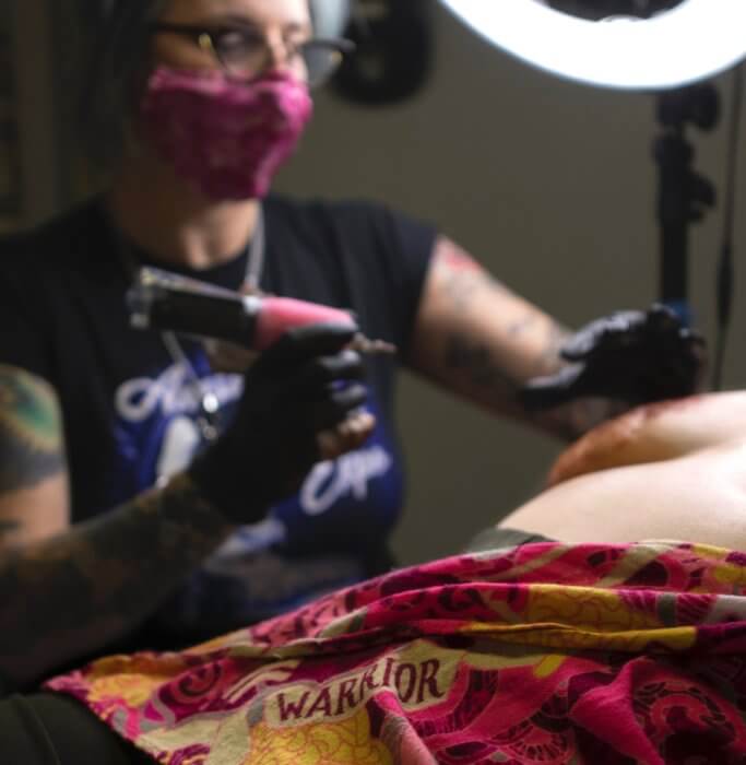 Tattoo shop honors cancer survivors, News