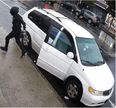 Surveillance video shows Elhorin Yisreal robbing a post office in the Unionport Bronx area on Sept. 6, 2022.