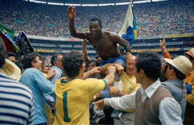Brazil's Pele, center, is hoisted on the shoulders of his teammates after Brazil won the World Cup soccer final against Italy, 4-1, in Mexico City's Estadio Azteca, Mexico.