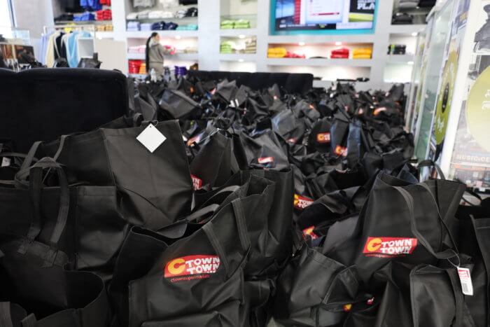 1,000 bags await to be given away at UP NYC at 2490 Third Ave. The men's clothing store is owned by Hip Hop legend, FatJoe.