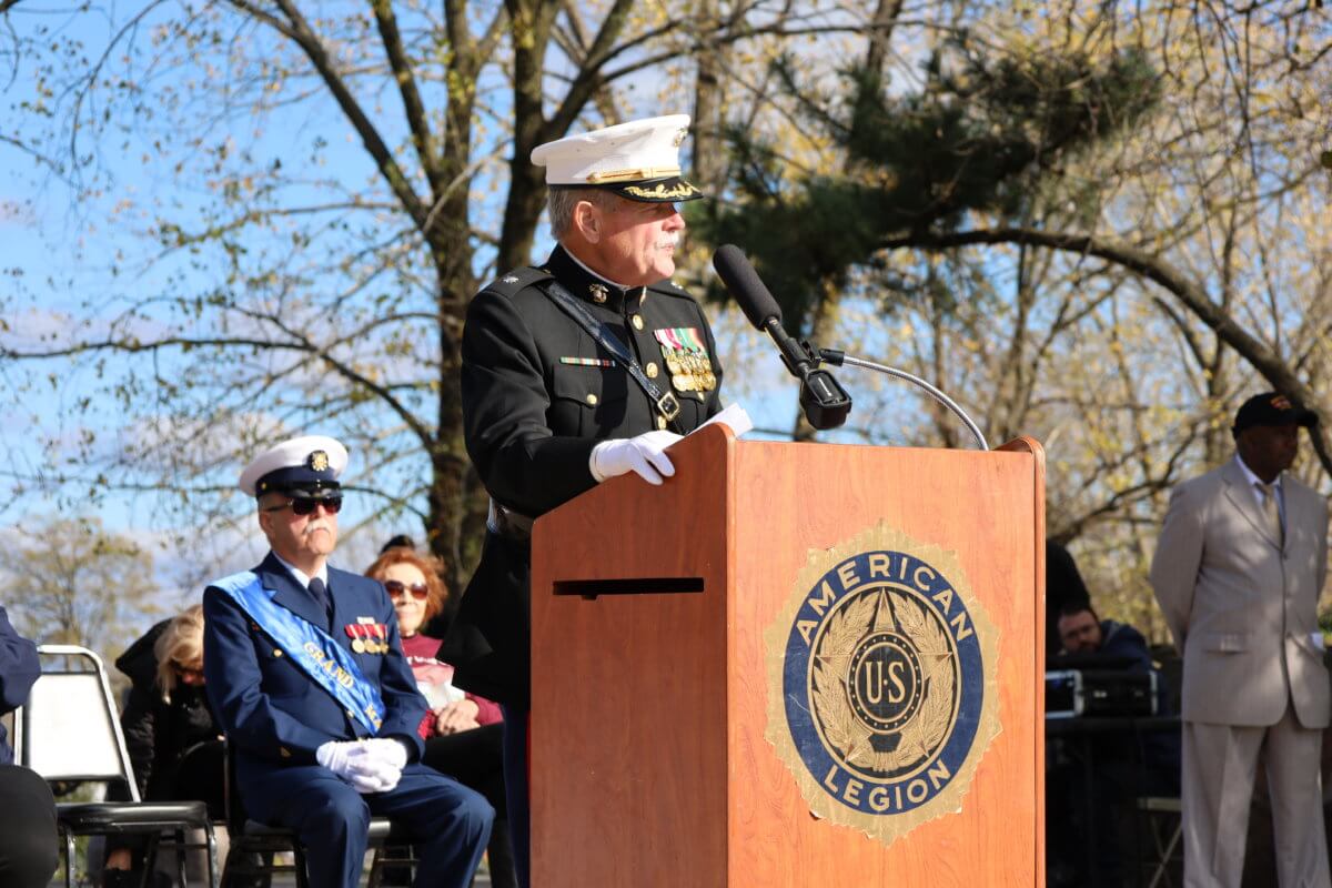 Retired U.S. Marine Corps Lieutenant Colonel Ron Watson leads the Veterans Day ceremony on Nov. 13 at the Bicentennial Veteran's Memorial Park in Throggs Neck.