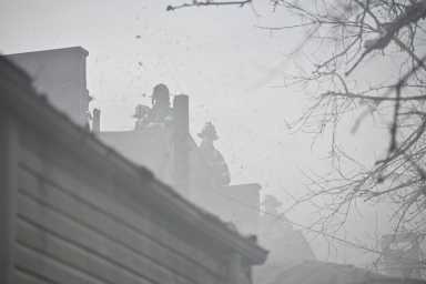 FDNY personnel are seen responding to a fire in the Bronx on Monday, Jan. 30, 2023.