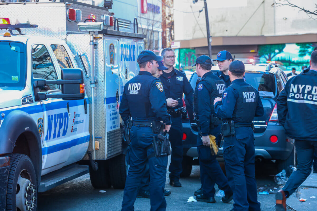 The NYPD Emergency Services Unit responds to the scene of a quadruple shooting on East Tremont Avenue in the Bronx on Feb. 10, 2023. Photo by Adrian Childress