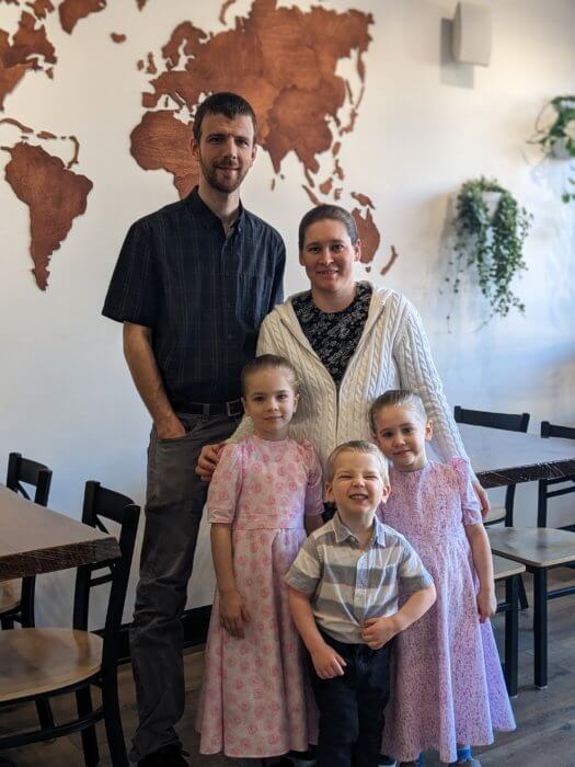 Weaver and his wife pose with three kids