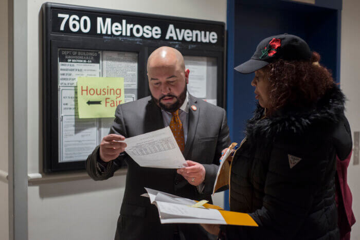 Council Member Rafael Salamanca Jr. attends a Tenant Resource Fair in his district in 2023.