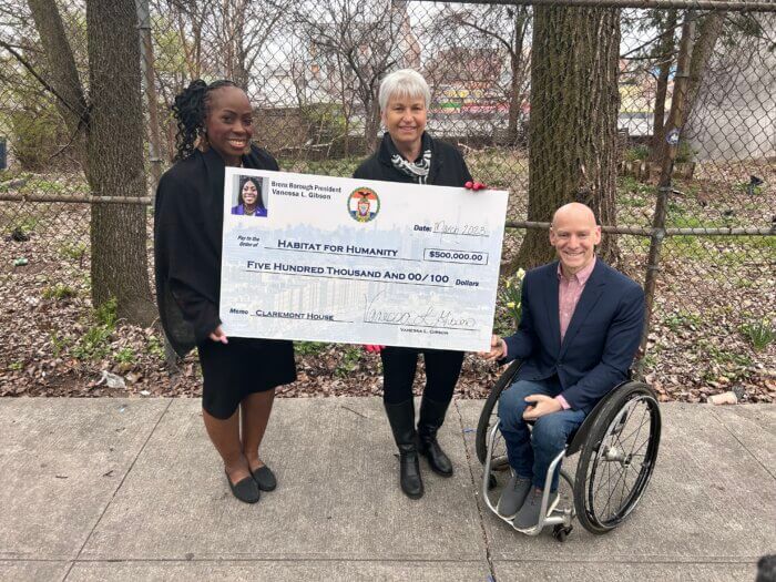 Bronx Borough President Vanessa Gibson awards a grant to the Claremont House.