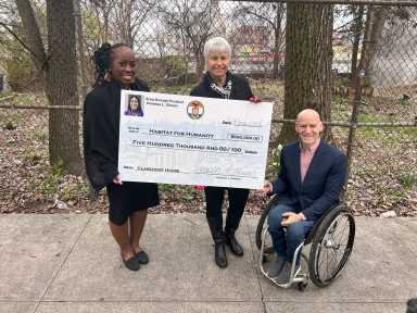 Bronx Borough President Vanessa Gibson awards a grant to the Claremont House.