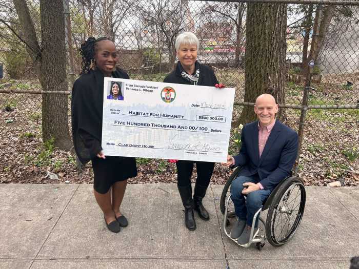 Bronx Borough President Vanessa Gibson awards a grant to the Claremont House.