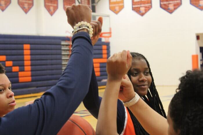 Some of the Hostos Caimans women's basketball players are seen on campus on Thursday, March 16, 2023.