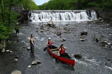 People paddling on the Bronx River