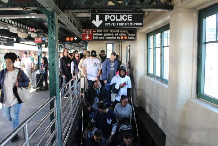 Baseball fans exit the 161st Street subway station during opening weekend on Saturday, April 1, 2023.